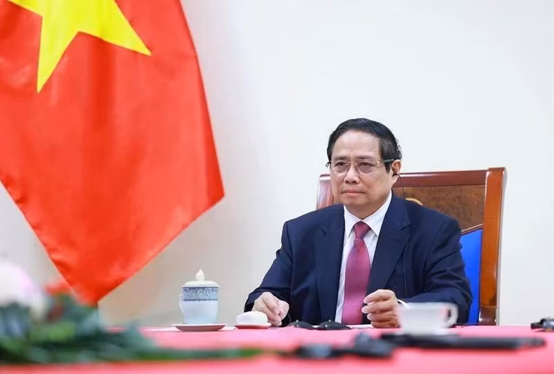 越南政府总理范明正与新西兰总理克里斯托弗·拉克森通电话（图片来源：越通社）