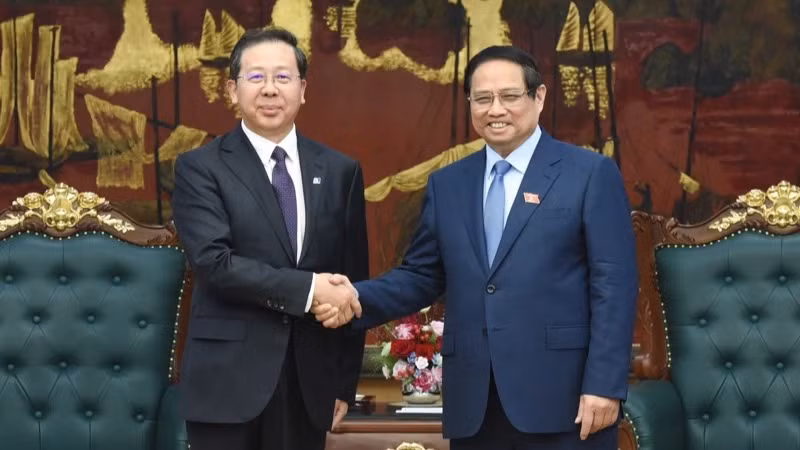 范明正总理（右）与彭刚平董事长。