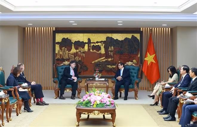 政府总理范明正会见奥地利驻越南大使。（图片来源：越通社）