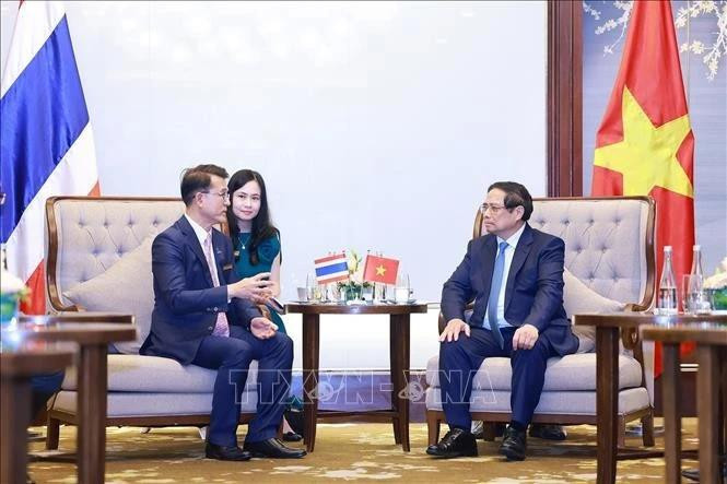范明正总理会见开泰银行董事长钟拉·拉塔纳皮安。（图片来源：越通社）