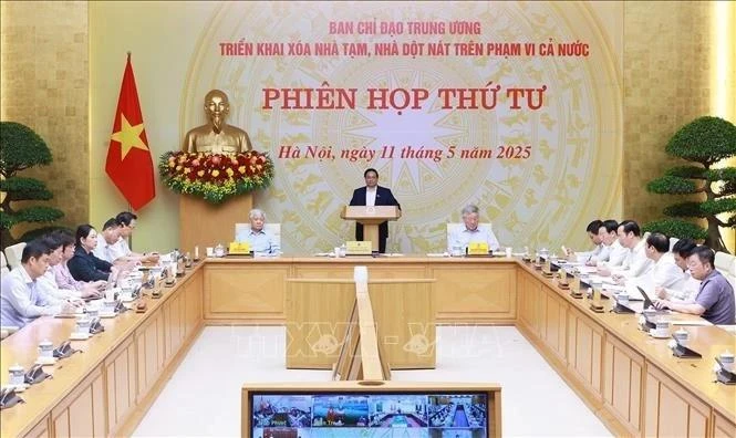 范明正总理主持会议。（图片来源：越通社）