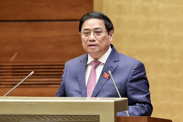 范明正总理在会上发表讲话。