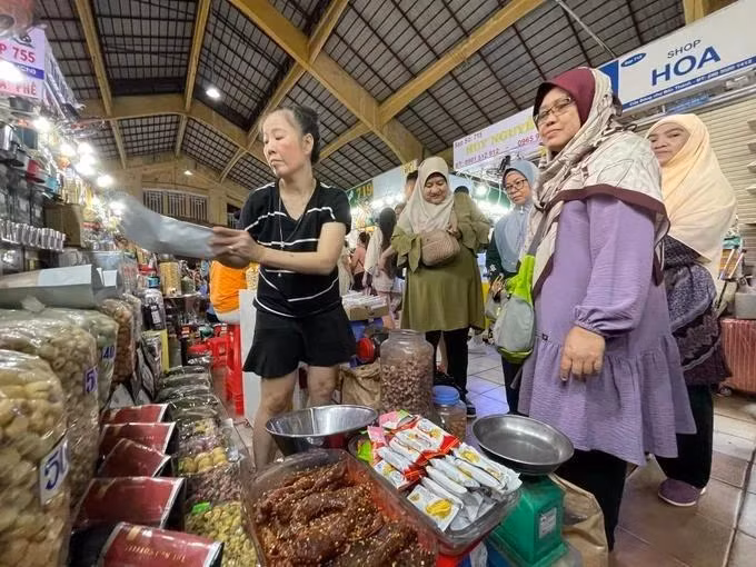海外越南人积极引进和消费越南产品。（图片来源：越通社）