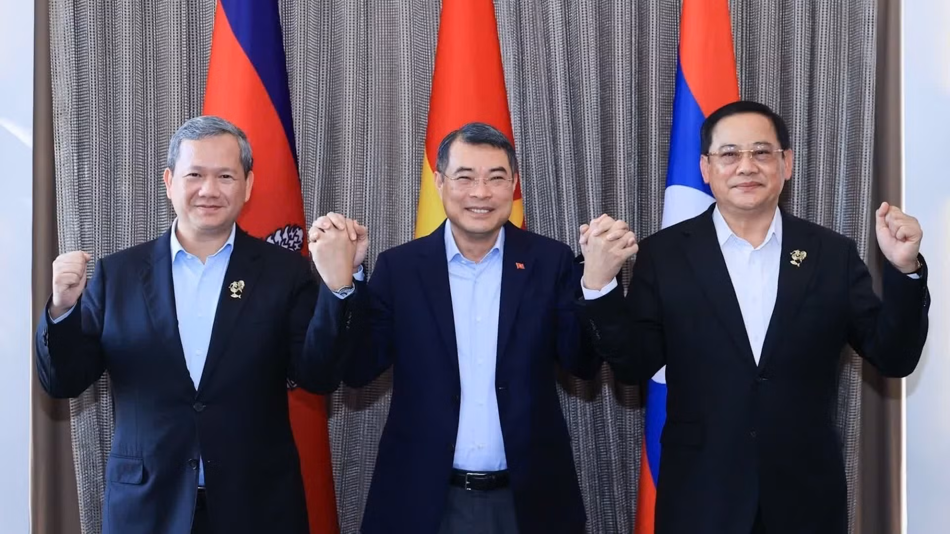 越南政府总理黎明兴和柬埔寨王国首相洪玛奈以及老挝政府总理宋赛·西潘敦。（图片来源：越通社）