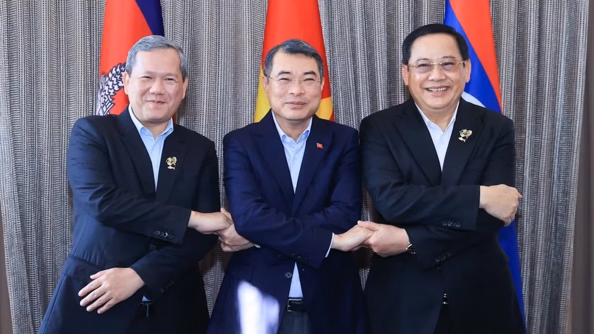 越南政府总理黎明兴和柬埔寨王国首相洪玛奈以及老挝政府总理宋赛·西潘敦。（图片来源：越通社）
