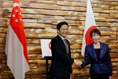 新加坡总理黄循财和日本首相高市早苗。（图片来源：AP）