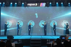 越南与中国宣布建立基于二维码的双边零售支付连接的仪式。