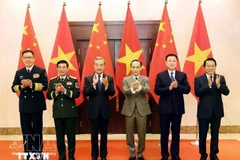 越中外交、国防、公安“3+3”战略对话机制首次部长级会议上的两国外交部长、国防部长和公安部长。