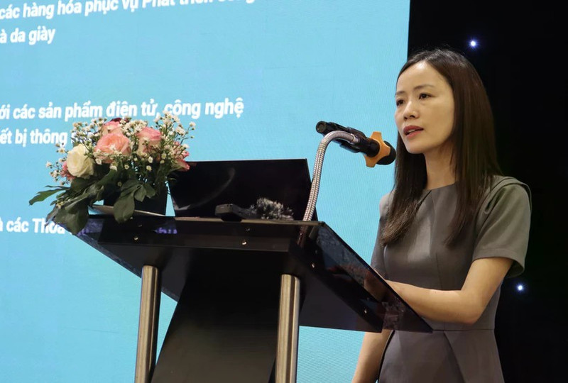 工贸部国外市场发展司黎氏梅英在研讨会上发表讲话。（图片来源：越通社）