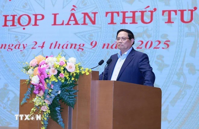 政府总理范明正在会上发言。（图片来源：越通社）