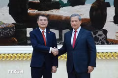 越南政府总理黎明兴与柬埔寨首相洪玛奈。（图片来源：越通社）