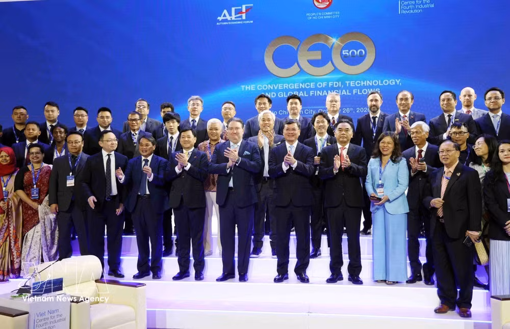 与会代表合影。图自越通社