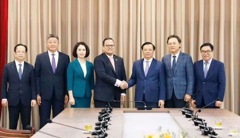 双方代表合影。