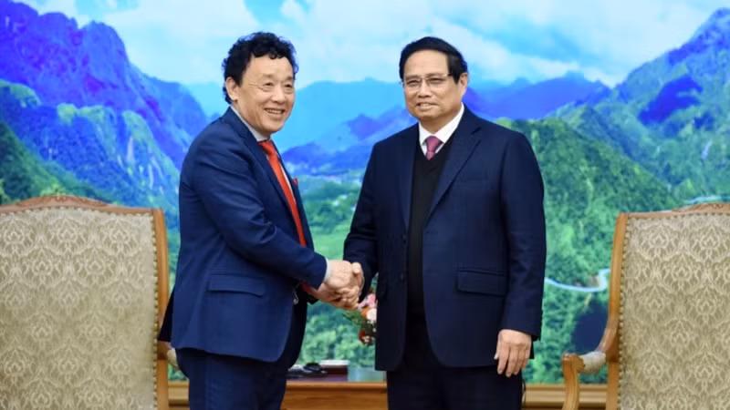越南政府总理范明正会见国际粮农组织总干事屈冬玉。