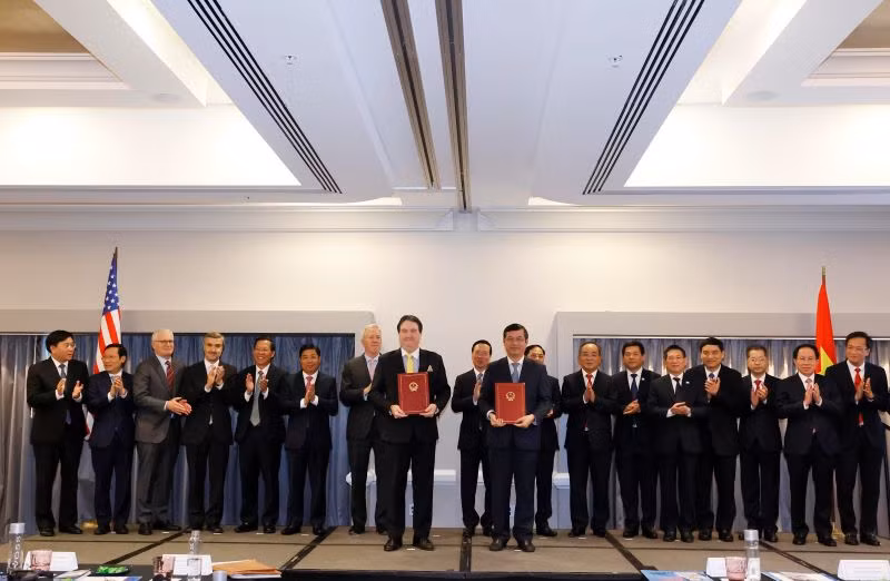 越南国家主席武文赏见证越美伙伴合作备忘录的签署。