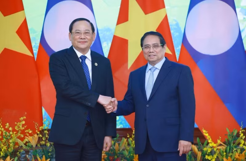越南政府总理范明正与老挝政府总理宋赛·西潘敦。