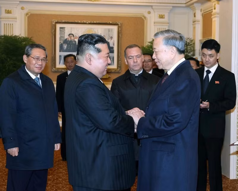 越共中央总书记苏林与朝鲜劳动党总书记、国务委员长金正恩。（图片来源：越通社）