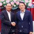 越南公安部部长梁三光会见老挝人民革命党中央书记处常务书记维莱·拉坎丰。（图片来源：越通社）