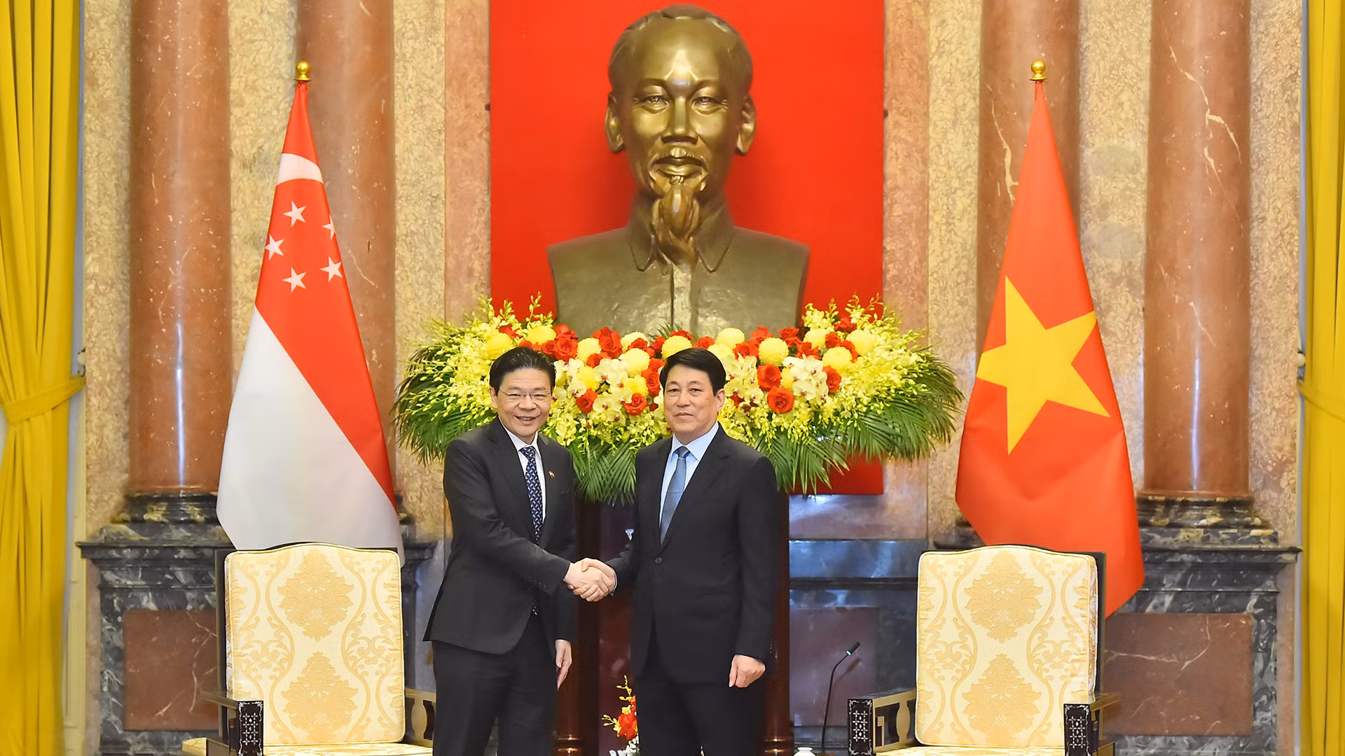 越南国家主席梁强会见新加坡总理黄循财。
