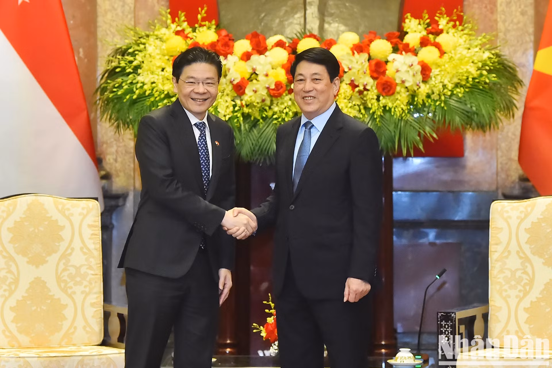 越南国家主席梁强会见新加坡总理黄循财。