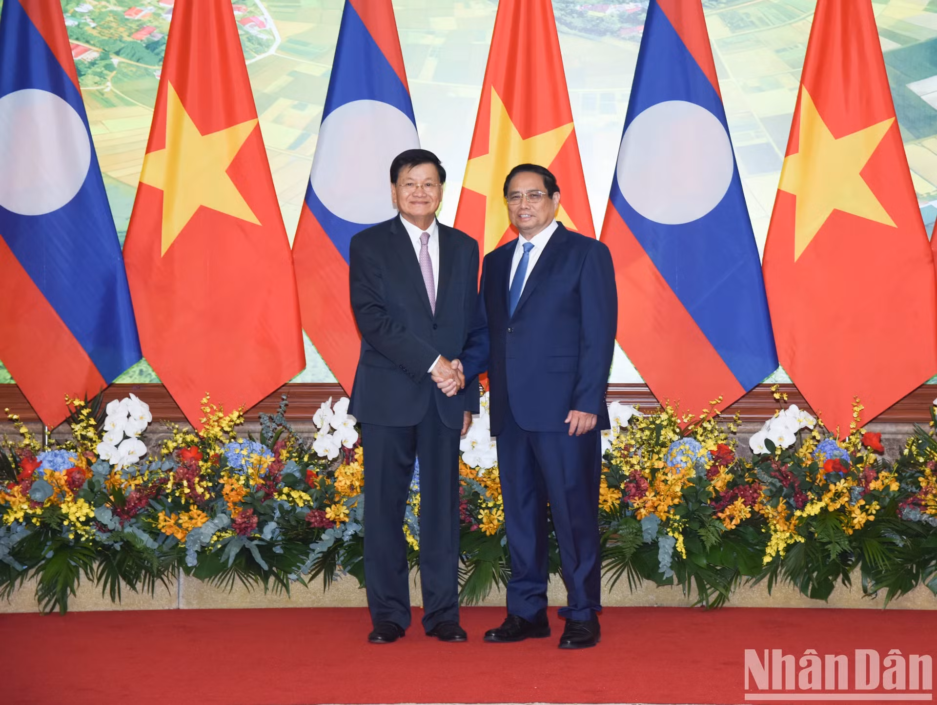 越南政府总理范明正和老挝人民革命党中央总书记、国家主席通伦·西苏。
