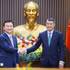 越南政府总理黎明兴和三星电子联席首席执行官卢泰文。（图片来源：越通社）