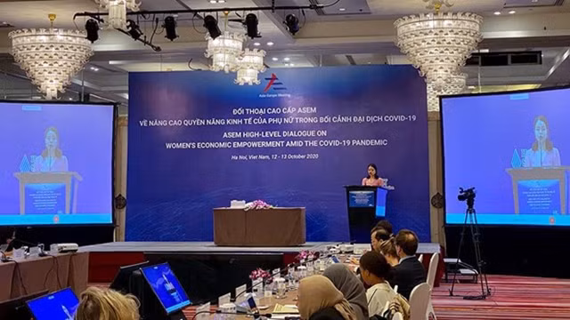 “新冠肺炎疫情背景下促进妇女经济赋权”的高级对话场景。（图片来源：越通社）