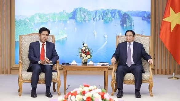 政府总理范明政会见老挝司法部部长帕维·西布阿利法。