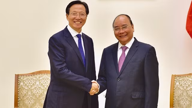越南政府总理阮春福会见中国农业农村部部长韩长赋。（陈海 摄）