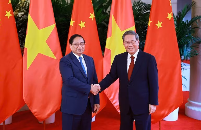 越南政府总理范明正与中国国务院总理李强。