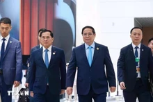 越南政府总理范明正一行出席世界经济论坛(WEF)第16届新领军者年会。(图片来源:越通社)