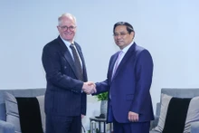 范明正总理会见南非工商会副主席尼尔·波洛克。