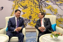 范明正总理会见蒙古国总统呼日勒苏赫。