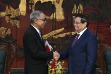 范明正总理会见印度尼西亚驻越大使。（陈海 摄）