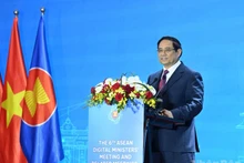 范明正总理在会议上致辞。（陈海 摄）