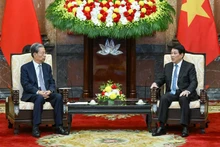越南国家主席梁强会见中国全国人大委员长赵乐际。