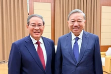 越共中央总书记苏林会见中国国务院总理李强。(图片来源:越通社)
