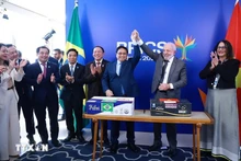 范明正总理与卢拉·达席尔瓦总统共同见证了首批从巴西出口至越南的冷藏牛肉集装箱启运仪式。（图片来源：越通社）