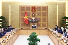 越南政府总理范明正会见中国山东省委书记林武。