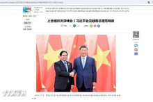 新华社刊登有关中国国家主席习近平会见越南政府总理范明正的文章。