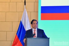 政府总理范明正出席越俄企业论坛。（青江 摄）