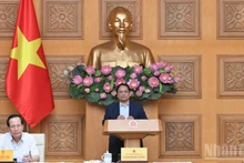 越南政府总理范明正主持会议。