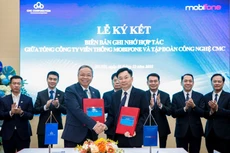 越南移动通信总公司（MobiFone）与CMC在河内签署全面合作谅解备忘录。（图片来源：越通社）