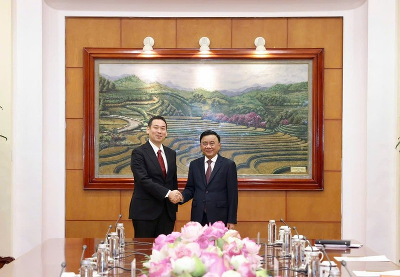 越共中央政治局委员、中央书记处常务书记陈锦秀在越共中央驻地会见日本共产党书记局代局长、主席团副主席Tanaka Yu。