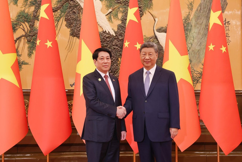 越南国家主席梁强与中共中央总书记、中国国家主席习近平。（图片来源：越通社）