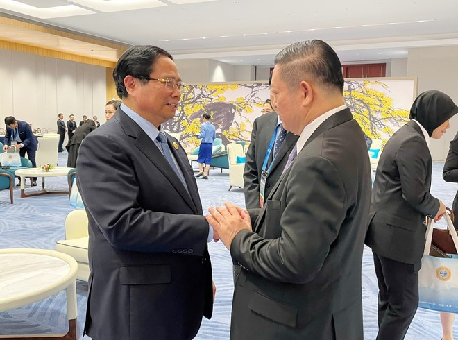 范明正总理会见东盟秘书长高金洪。(图片来源:越通社) tiep4.jpg