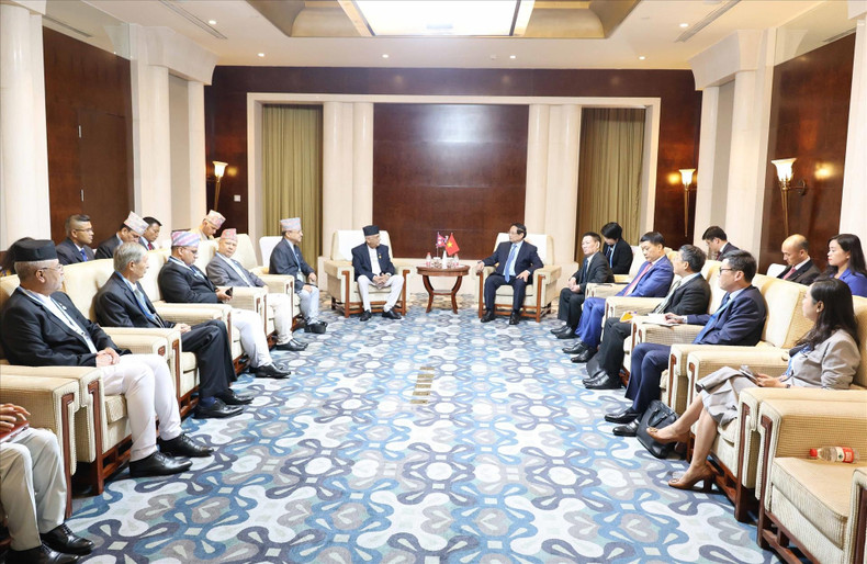 双方会见场面。(图片来源:越南画报) nepal.jpg