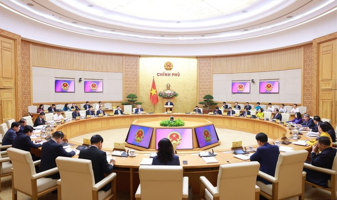 会议场景。(图片来源:越通社) phaminhchinh1.jpg