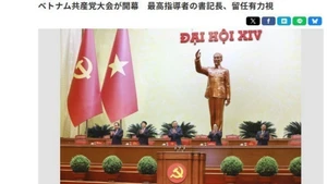 日本共同社报道越南共产党第十四次全国代表大会。（图片来源：越通社）