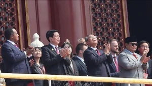越南国家主席梁强率越南高级代表团出席了纪念活动。图片来源：越通社